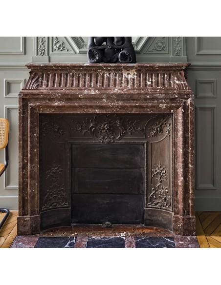 Antique "Boudin Haut" fireplace mantel in red "Rouge Royal" marble.