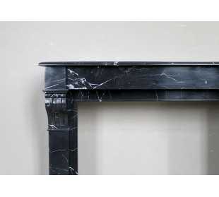 Antique "Modillon" fireplace carved in Black Marquinia marble with white veins. 2