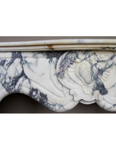 046 LOUIS XV “COEUR” FIREPLACE OF PROVENCAL STYLISM CARVED IN CHARMING BRÈCHE VIOLETTE MARBLE