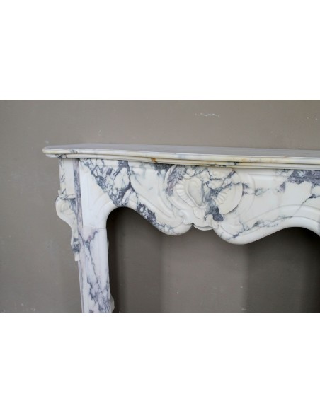 046 LOUIS XV “COEUR” FIREPLACE OF PROVENCAL STYLISM CARVED IN CHARMING BRÈCHE VIOLETTE MARBLE