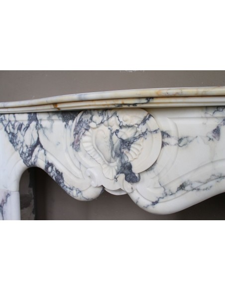 046 LOUIS XV “COEUR” FIREPLACE OF PROVENCAL STYLISM CARVED IN CHARMING BRÈCHE VIOLETTE MARBLE