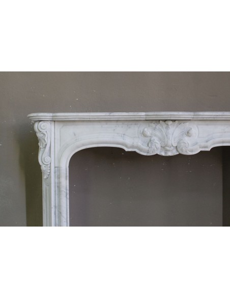 071 ANTIQUE “LOUIS XV CÔTE D'AZUR” FLORAL FIREPLACE MANTEL CARVED FROM WHITE CARRARA MARBLE