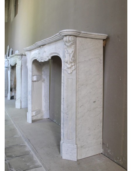 071 ANTIQUE “LOUIS XV CÔTE D'AZUR” FLORAL FIREPLACE MANTEL CARVED FROM WHITE CARRARA MARBLE