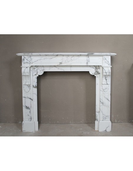 Antique Louis Philippe “Palmettes” fireplace carved in white Statuary Arabescato marble, with very fine sculptural decorations.