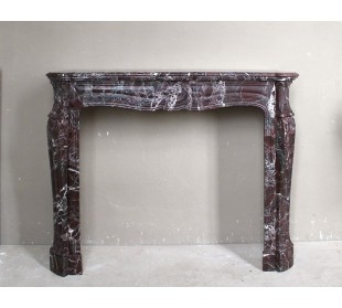 Antique Levanto Red marble fireplace mantel carved in the 19th century, belonging to the Pompadour family.