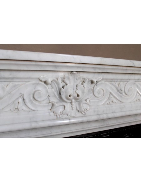 251 AG NEOCLASSICAL "ESCARGOT" FIREPLACE MANTEL CARVED OUT OF WHITE CARRARA MARBLE PROVIDED WITH ITS ORIGINAL CAST IRON INSERT