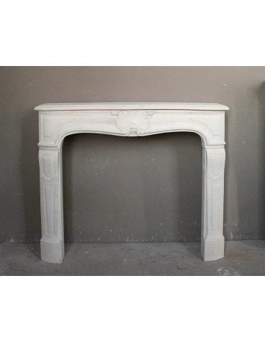 Antique Pierre Dorée stone fireplace mantel of Louis XV style, baroque and ornate, dating back to the 19th century.