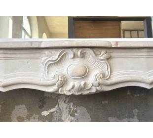 Antique baroque-style fireplace mantel carved in Beaujolais stone. 2