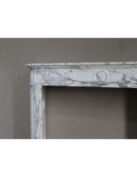 216 LOUIS XVI “DÉMI-LUNE MARGUERITE” FIREPLACE MANTEL IN STUNNING WHITE ARABESCATO MARBLE