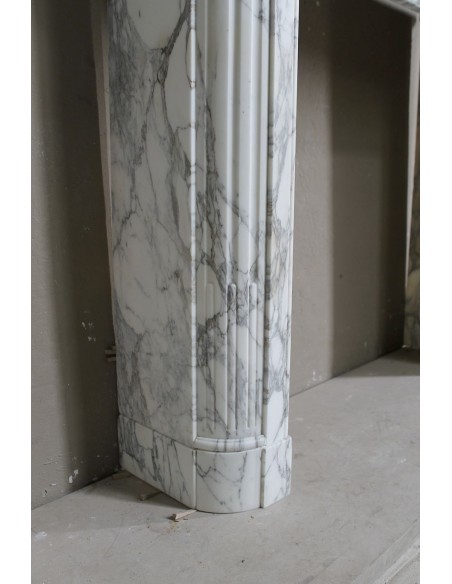 216 LOUIS XVI “DÉMI-LUNE MARGUERITE” FIREPLACE MANTEL IN STUNNING WHITE ARABESCATO MARBLE