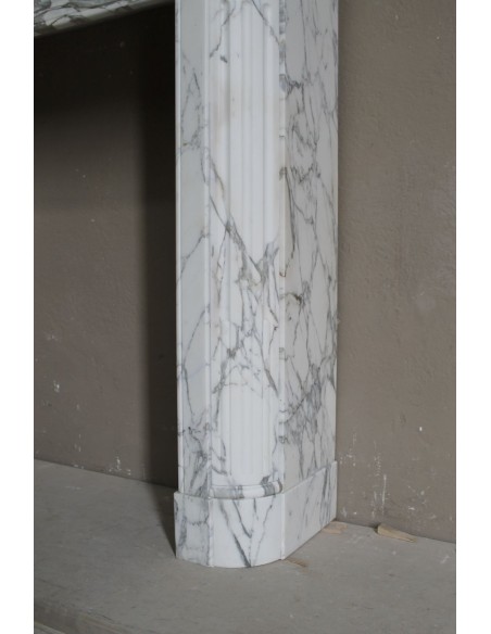 216 LOUIS XVI “DÉMI-LUNE MARGUERITE” FIREPLACE MANTEL IN STUNNING WHITE ARABESCATO MARBLE
