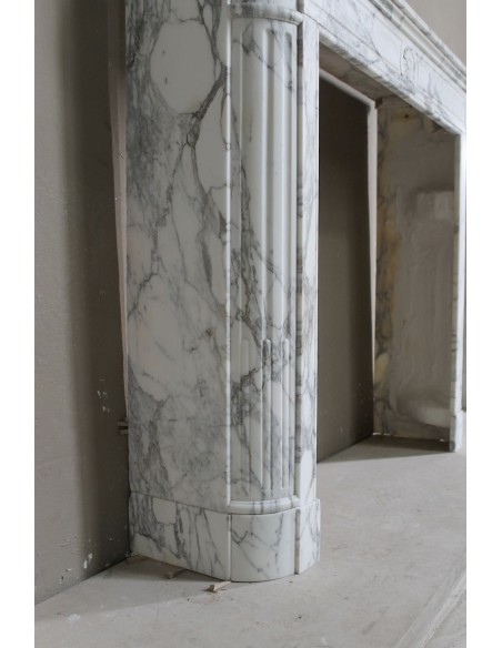 216 LOUIS XVI “DÉMI-LUNE MARGUERITE” FIREPLACE MANTEL IN STUNNING WHITE ARABESCATO MARBLE