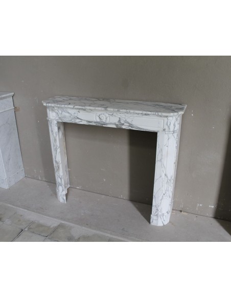 216 LOUIS XVI “DÉMI-LUNE MARGUERITE” FIREPLACE MANTEL IN STUNNING WHITE ARABESCATO MARBLE