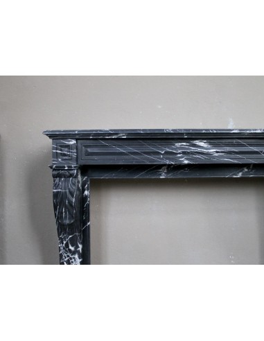Antique fireplace in black Marquinia marble, a model called "Diamond Tip". This is a truly antique marble mantel.