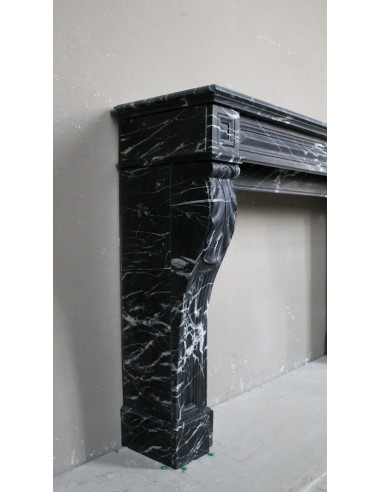 Antique fireplace in black Marquinia marble, a model called "Diamond Tip". This is a truly antique marble mantel.