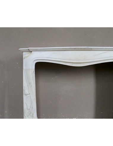 Art Nouveau “Fleur de Chardon” mantel in white marble and signed Majorelle. This marble fireplace is extremely rare and refined.