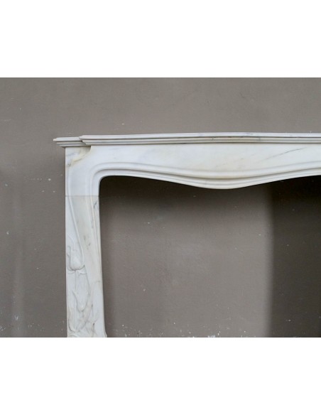 Art Nouveau “Fleur de Chardon” mantel in white marble and signed Majorelle. This marble fireplace is extremely rare and refined.
