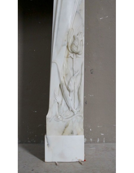 Art Nouveau “Fleur de Chardon” mantel in white marble and signed Majorelle. This marble fireplace is extremely rare and refined.