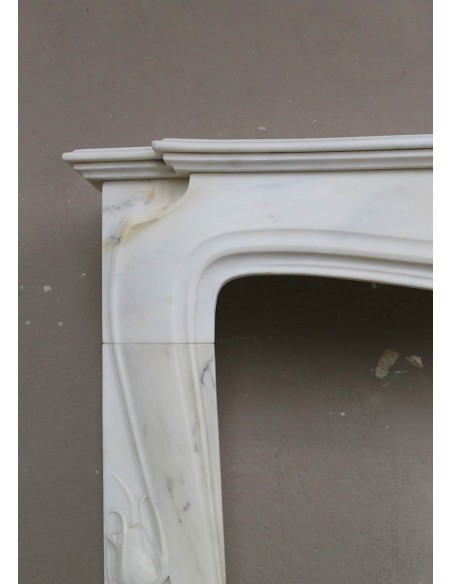 Art Nouveau “Fleur de Chardon” mantel in white marble and signed Majorelle. This marble fireplace is extremely rare and refined.