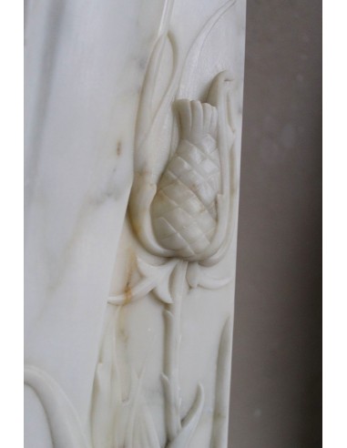 Art Nouveau “Fleur de Chardon” mantel in white marble and signed Majorelle. This marble fireplace is extremely rare and refined.