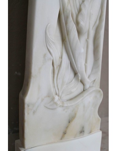 Art Nouveau “Fleur de Chardon” mantel in white marble and signed Majorelle. This marble fireplace is extremely rare and refined.