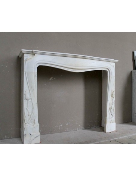 Art Nouveau “Fleur de Chardon” mantel in white marble and signed Majorelle. This marble fireplace is extremely rare and refined.