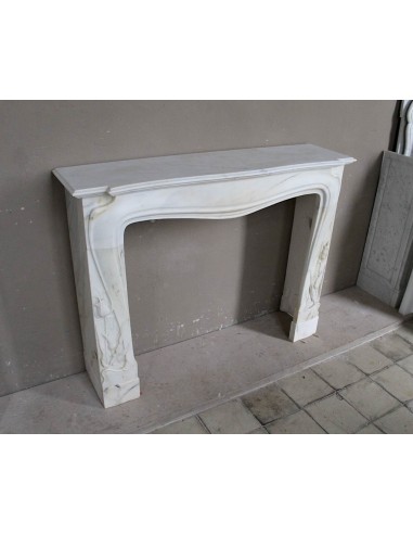 Art Nouveau “Fleur de Chardon” mantel in white marble and signed Majorelle. This marble fireplace is extremely rare and refined.