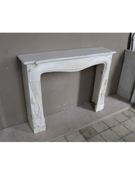 Art Nouveau “Fleur de Chardon” mantel in white marble and signed Majorelle. This marble fireplace is extremely rare and refined.