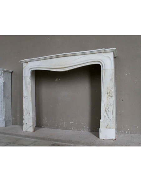 Art Nouveau “Fleur de Chardon” mantel in white marble and signed Majorelle. This marble fireplace is extremely rare and refined.