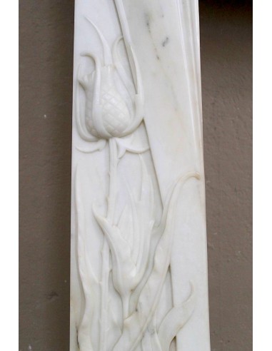 Art Nouveau “Fleur de Chardon” mantel in white marble and signed Majorelle. This marble fireplace is extremely rare and refined.