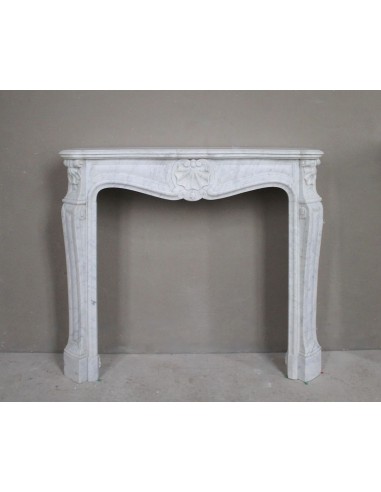 Louis XV style “Trois Coquilles” mantel carved in white Carrara marble, on sale at a discounted price.