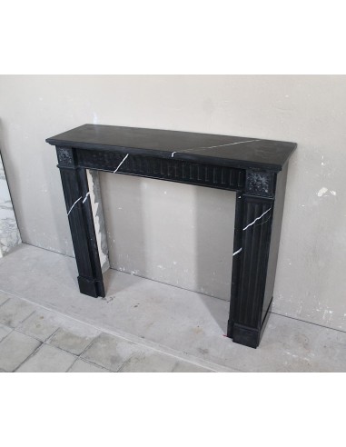 Neoclassical “Deux Roses” fireplace mantel carved in Black Marquinia marble with white veins, a true little gem.