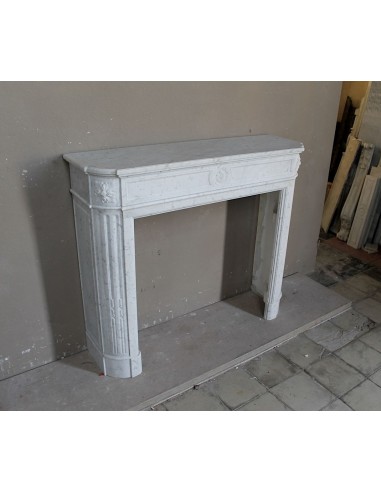 Antique Neoclassical "Démi-Lune” fireplace in White Carrara marble. This marble mantel is pretty rare to find.