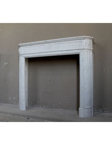 Antique Neoclassical "Démi-Lune” fireplace in White Carrara marble. This marble mantel is pretty rare to find.