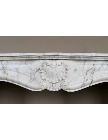 Antique Louis XV "Trois Coquilles Amélioré" fireplace mantel carved in veined White Calacatta marble. A rare and elegant mantel.