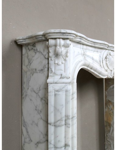 Antique Louis XV "Trois Coquilles Amélioré" fireplace mantel carved in veined White Calacatta marble. A rare and elegant mantel.