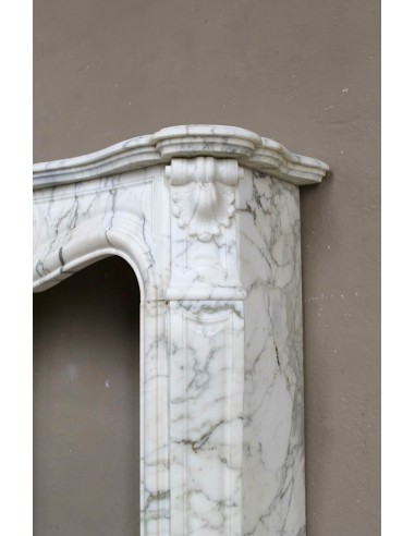Antique Louis XV "Trois Coquilles Amélioré" fireplace mantel carved in veined White Calacatta marble. A rare and elegant mantel.