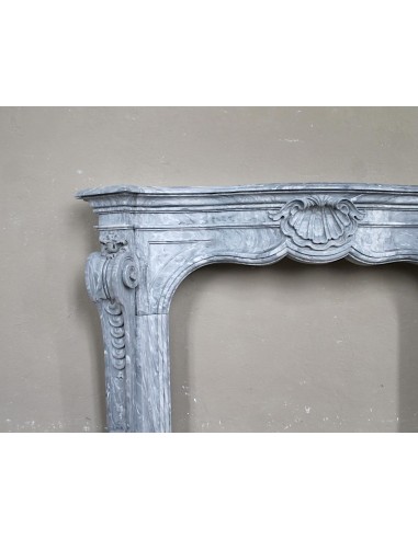 Important antique Italian Baroque fireplace in Gray Blue marble. This antique marble mantel is a truly unique piece.