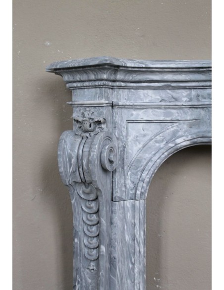Important antique Italian Baroque fireplace in Gray Blue marble. This antique marble mantel is a truly unique piece.