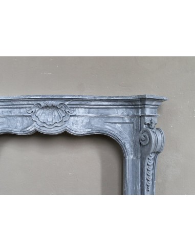 Important antique Italian Baroque fireplace in Gray Blue marble. This antique marble mantel is a truly unique piece.