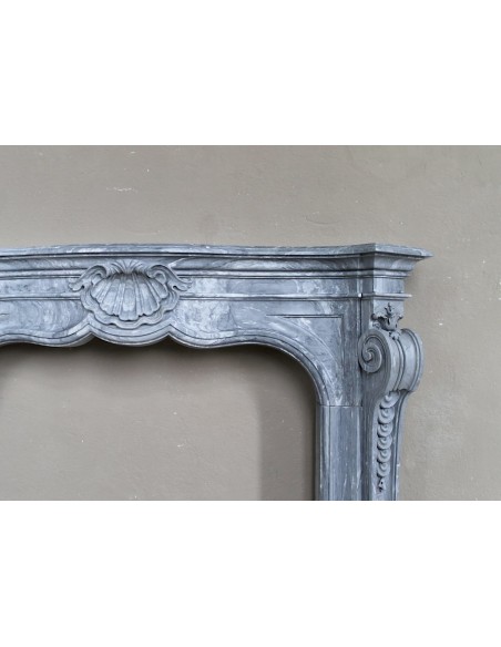 Important antique Italian Baroque fireplace in Gray Blue marble. This antique marble mantel is a truly unique piece.