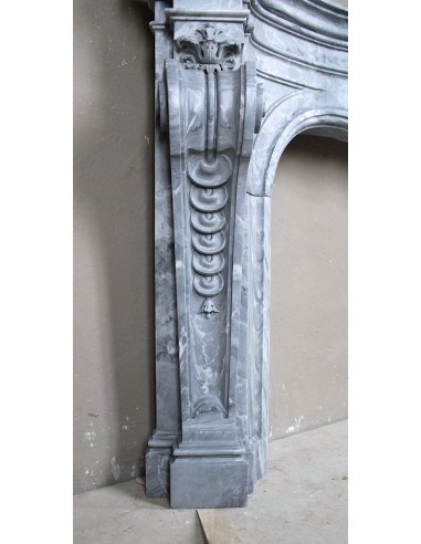 Important antique Italian Baroque fireplace in Gray Blue marble. This antique marble mantel is a truly unique piece.