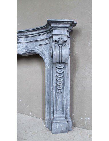 Important antique Italian Baroque fireplace in Gray Blue marble. This antique marble mantel is a truly unique piece.