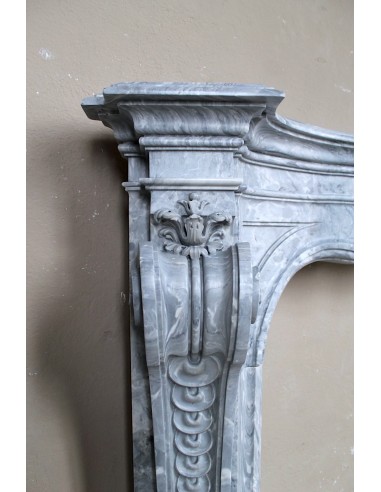 Important antique Italian Baroque fireplace in Gray Blue marble. This antique marble mantel is a truly unique piece.