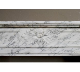 Neoclassical fire surround in Statuary Arabescato marble featuring soft gray veins on a white background. 2