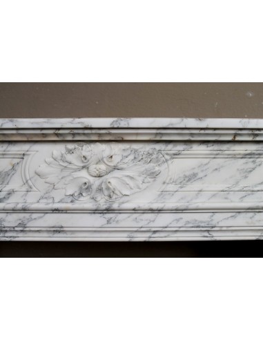 Neoclassical fire surround in Statuary Arabescato marble featuring soft gray veins on a white background.