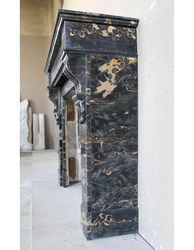 Antique Louis Philippe-style "Palmettes" fireplace mantel, carved in the very rare Black Portoro "Gold" marble.