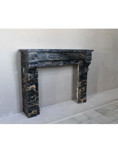 Antique Louis Philippe-style "Palmettes" fireplace mantel, carved in the very rare Black Portoro "Gold" marble.
