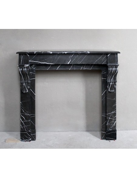 Antique Louis Philippe "Palmettes" fireplace mantel in stunning Black Marquinia marble, with very fine white veins.