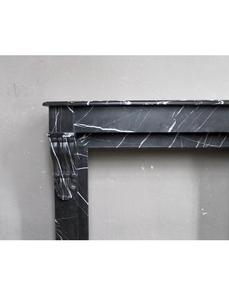 Antique Louis Philippe "Palmettes" fireplace mantel in stunning Black Marquinia marble, with very fine white veins.